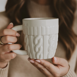 white sweater mug