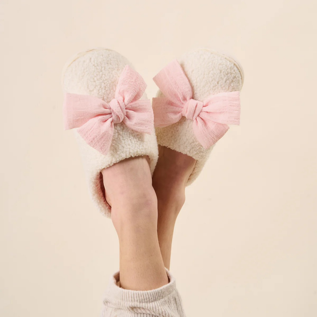 blush bow slippers