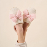 blush bow slippers