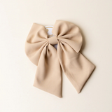 tan bow hair clip