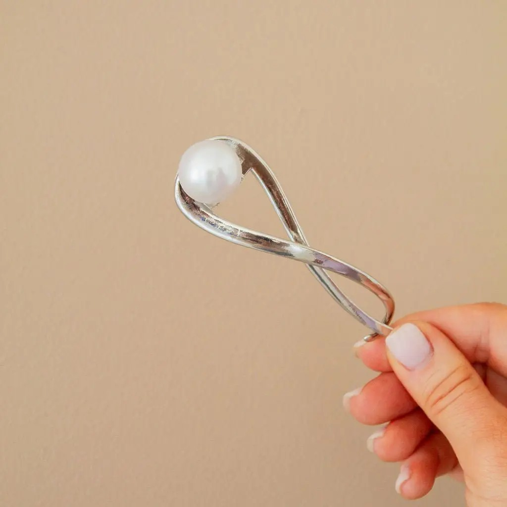 silver and pearl hair pin