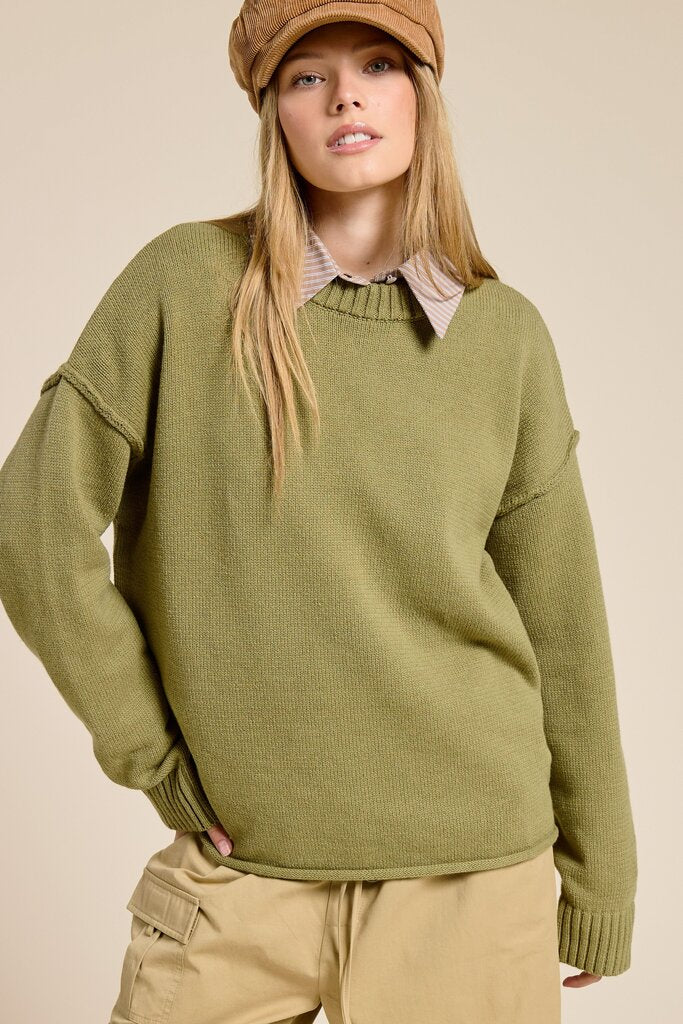 olive sweater with ribbed crew neckline and ribbed sleeve cuffs
