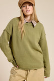 olive sweater with ribbed crew neckline and ribbed sleeve cuffs