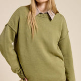 olive sweater with ribbed crew neckline and ribbed sleeve cuffs