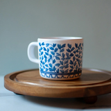 blue and white sippy cup