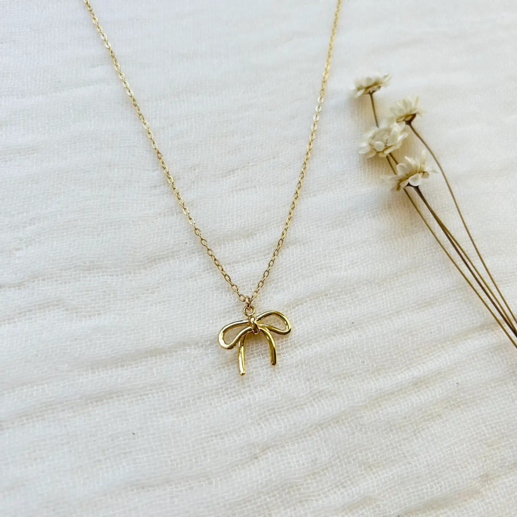 gold bow charm necklace