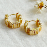 gold wave huggie hoops