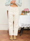 ecru floral jeans