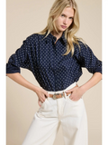 navy polka dot shirt