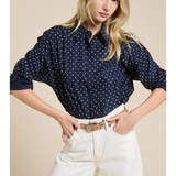 navy polka dot shirt