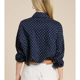 navy polka dot shirt