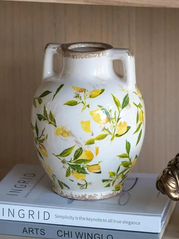 white ceramic vase with lemon motif and handles