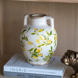 white ceramic vase with lemon motif and handles