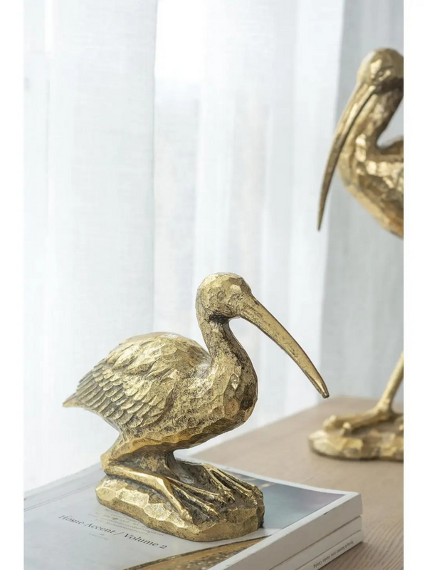 gold crane figurine