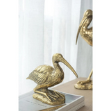 gold crane figurine