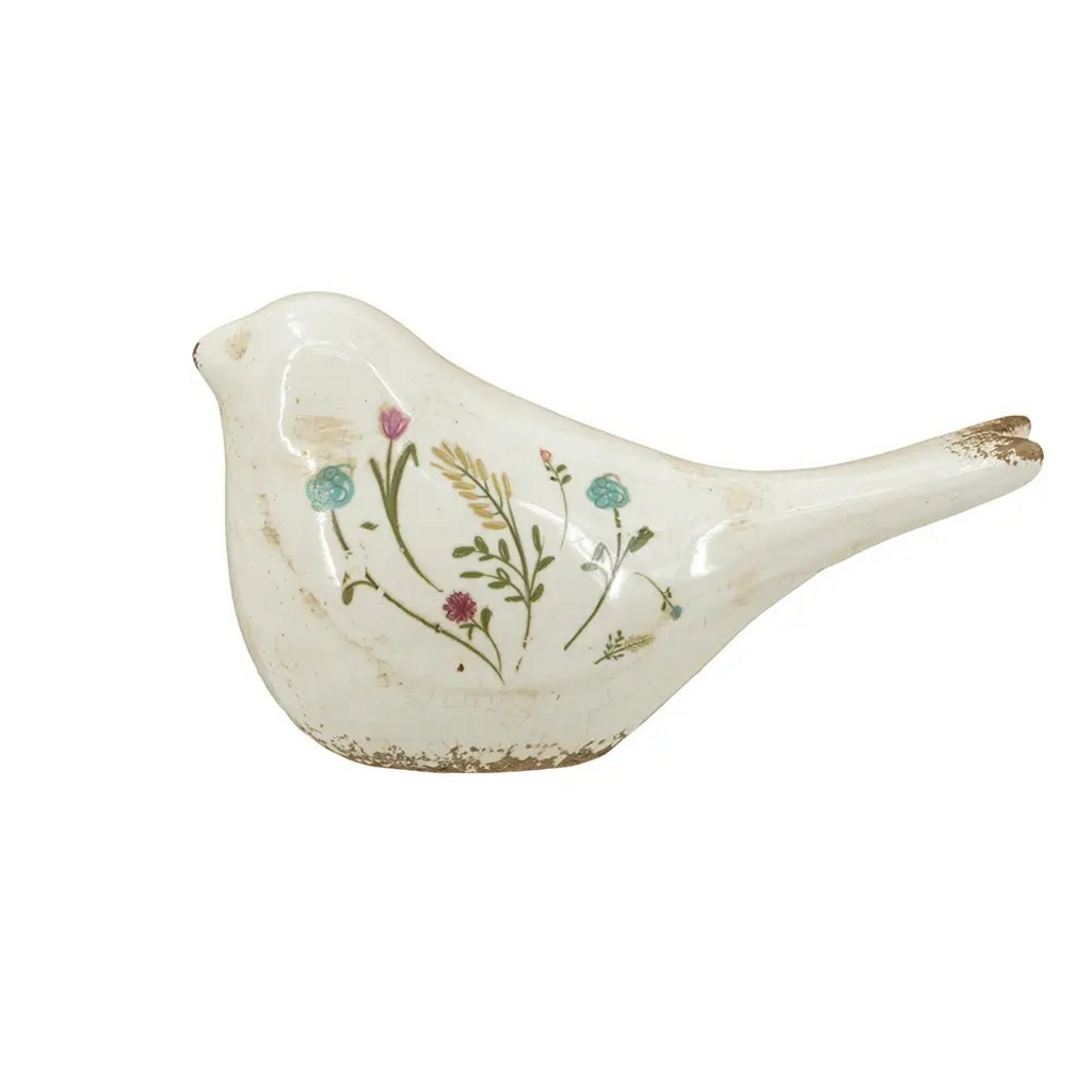 ceramic bird with floral pattern
