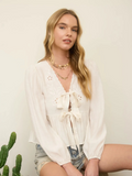 white floral eyelet embroidery front tie long sleeve top