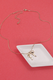 gold bow ribbon snake chain necklace