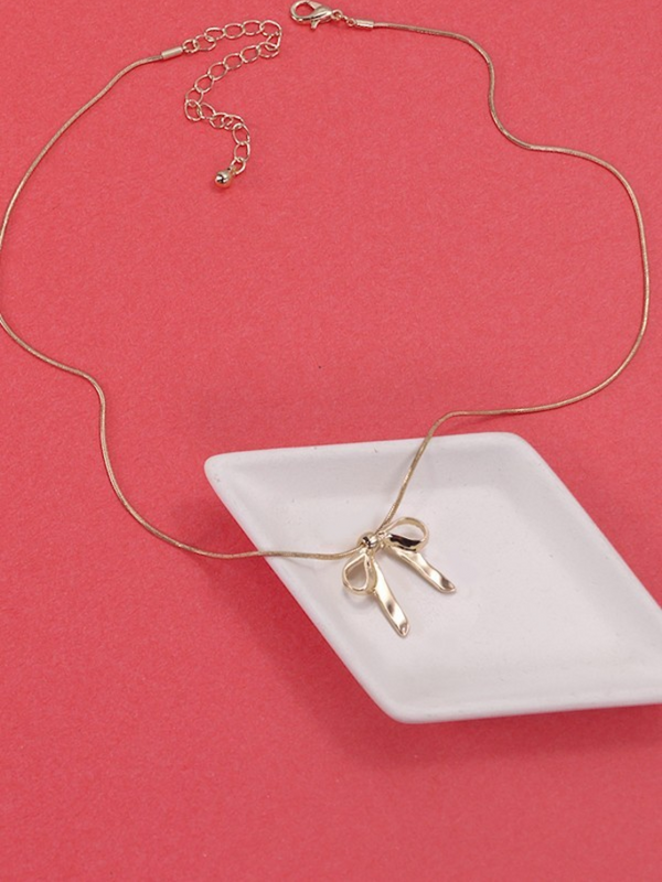 gold bow ribbon snake chain necklace