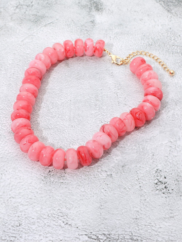 pink marbled chunky resin disc statement necklace