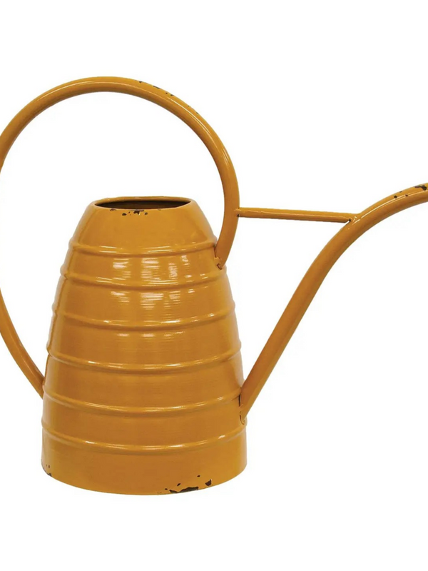 distressed metal beehive watering can