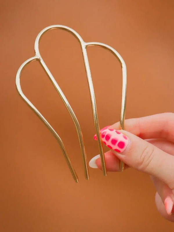 golden scalloped hair fork