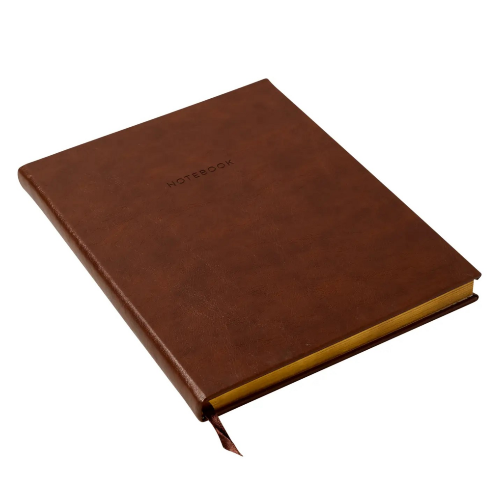 brown desk journal