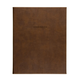 brown desk journal