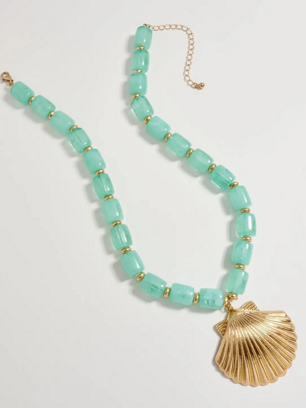 mint chunky beaded necklace with large gold seashell pendant