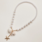 gold starfish and seashell pendant coastal charm pearl necklace