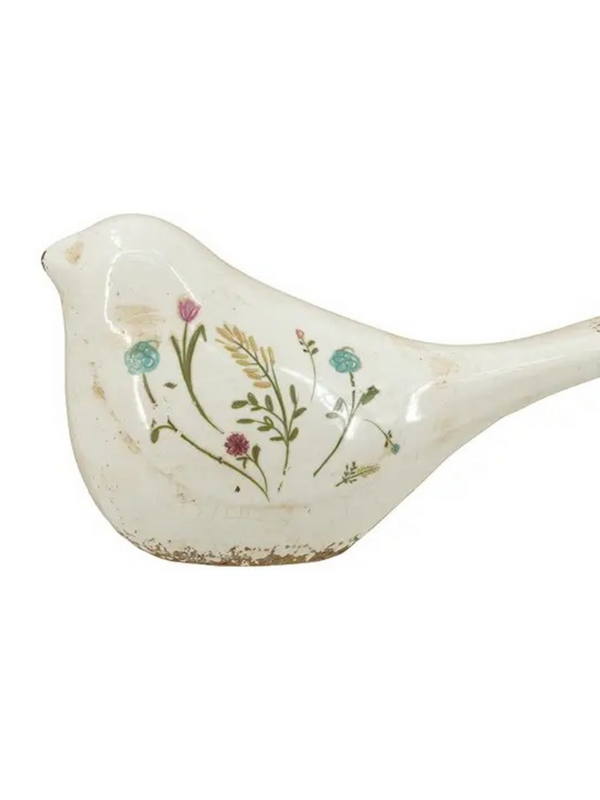 ceramic bird figurine with floral motif