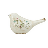 ceramic bird figurine with floral motif