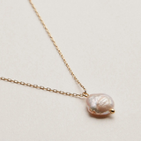 pearl pendant on gold chain necklace
