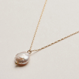 pearl pendant on gold chain necklace