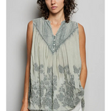 gray sheer sleeveless top with floral details
