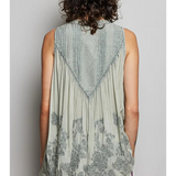 gray sheer sleeveless top with floral details