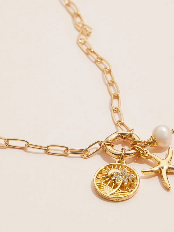 gold dipped starfish charm necklace with pearl accent