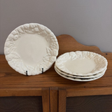 set of four white fruit border plates