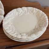 set of four white fruit border plates