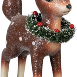 standing deer with wreath around the neck
