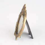 antique gold ornate round photo frame
