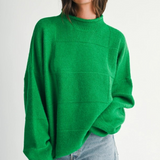 green knit sweater
