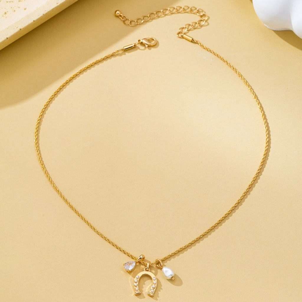 pave horseshoe and pearl drop charm necklace