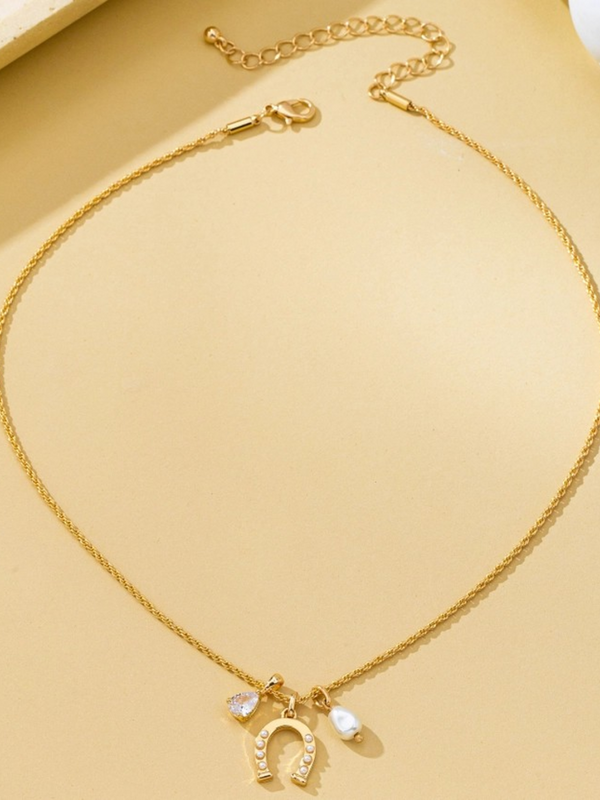 pave horseshoe and pearl drop charm necklace