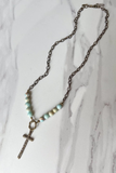 chain and bead necklace with cross charm