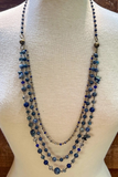 long blue tone necklace