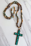 multi color stone necklace with large turquoise stone cross charm