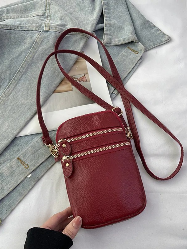 wine red cross body leather handbag