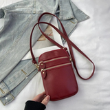wine red cross body leather handbag