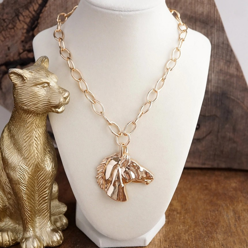 gold tone sculpted horse pendant necklace